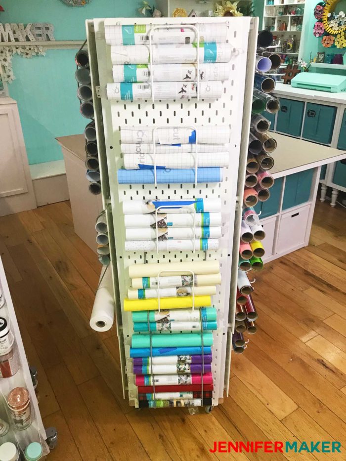 Craft Vinyl Storage showing pegboards with letter holders to hold the rolls