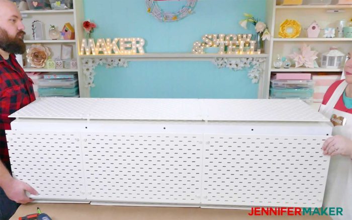 An IKEA Kallax unit covered with Skadis pegboards to create a craft vinyl storage organizer