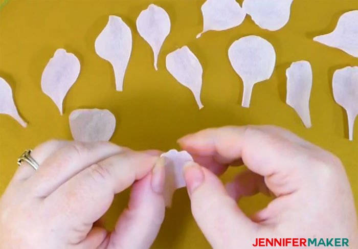 Ruffling the top edge of the crepe paper petals with my fingers