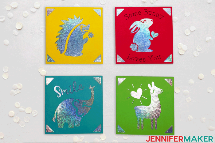 Square Cricut cards in yellow, red, blue, and green with animal designs in metallic cardstock