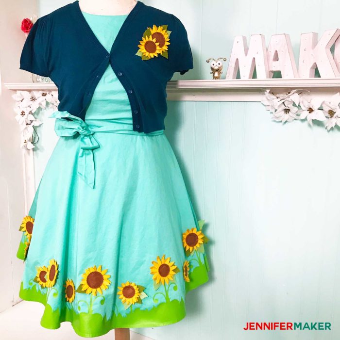 Dress embellished with felt sunflowers and iron-on vinyl made with a Cricut