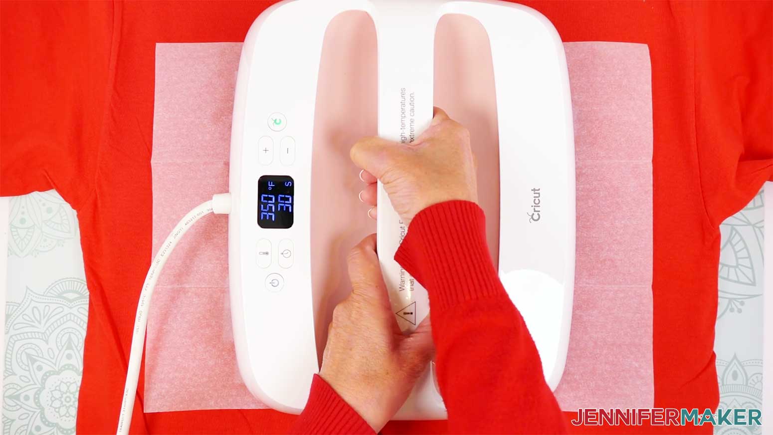 Press the Cricut DTF design onto the shirt using firm even pressure at the recommend time and temperature.