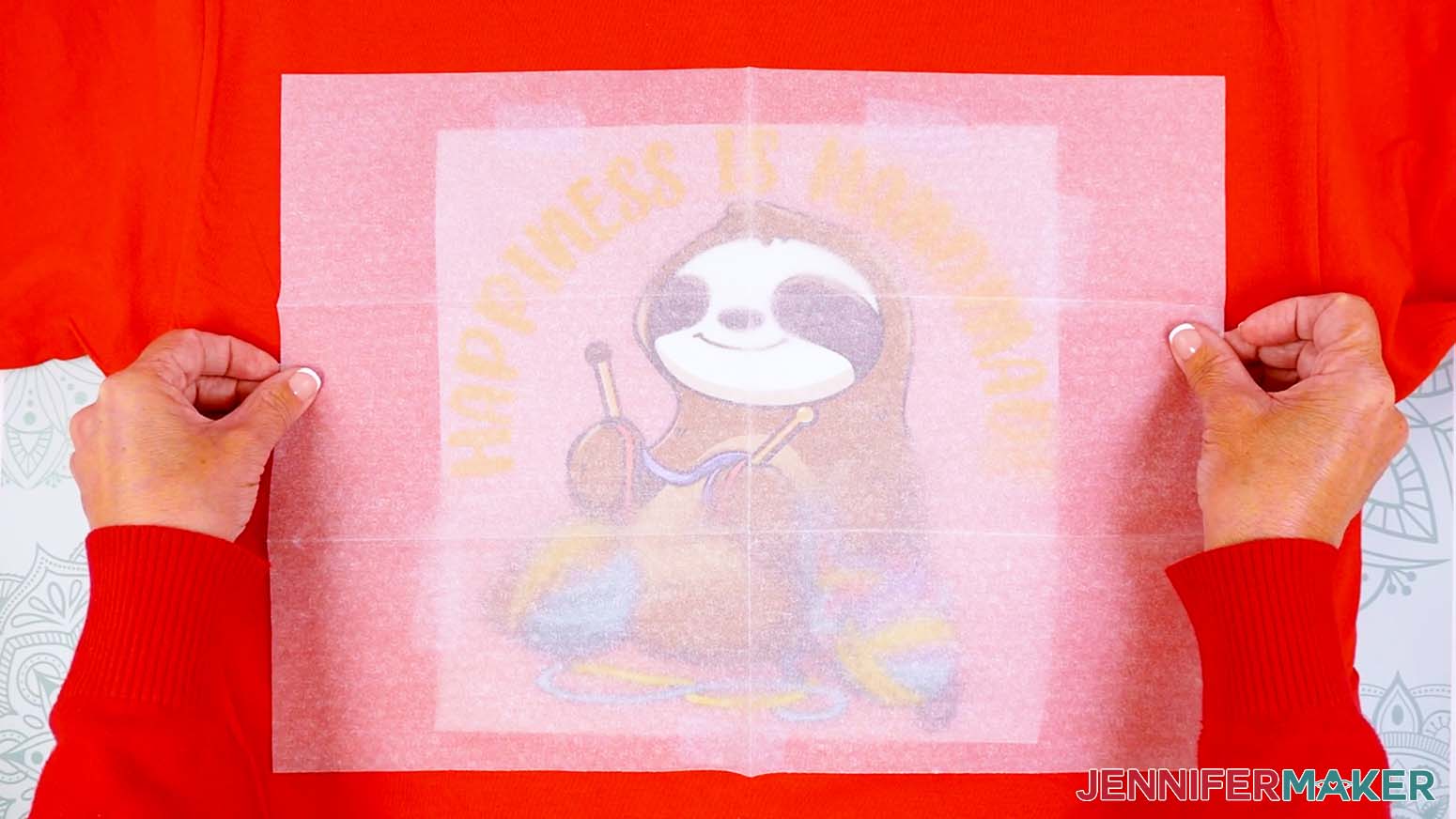 Cover the entire pressing area and Cricut DTF design transfer with a piece of parchment paper.