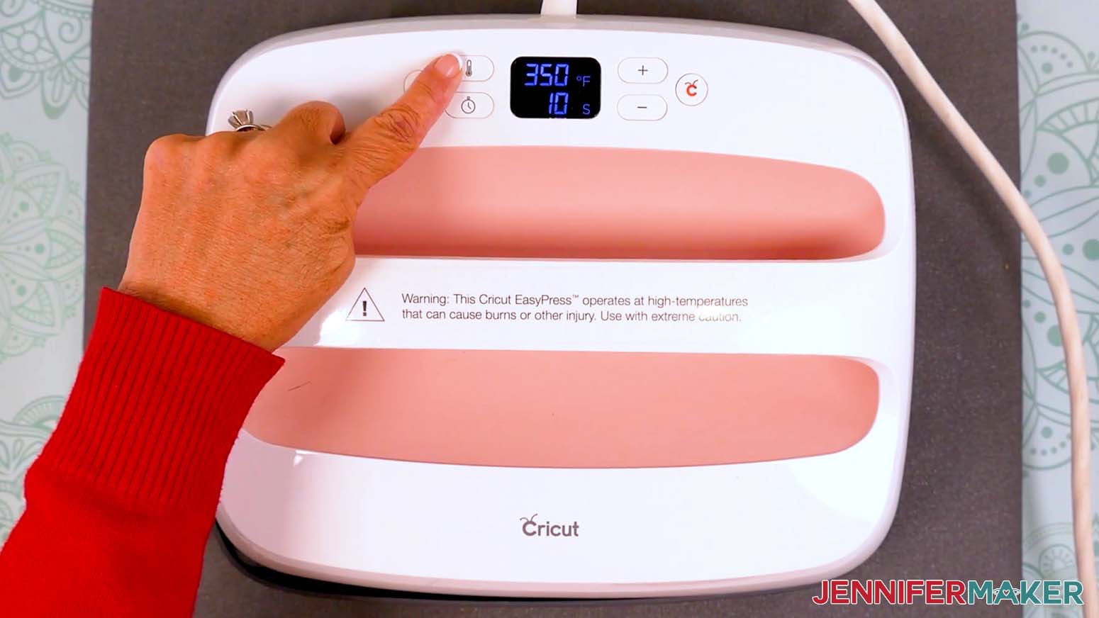 Heat the press to the correct temperature for the Cricut DTF transfer.