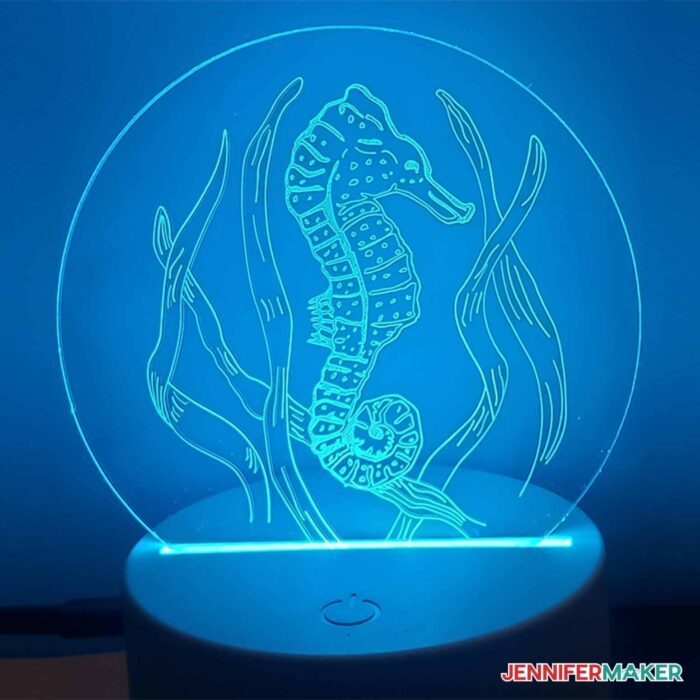 Acrylic nightlight engraved with a seahorse with a blue light illuminating from within