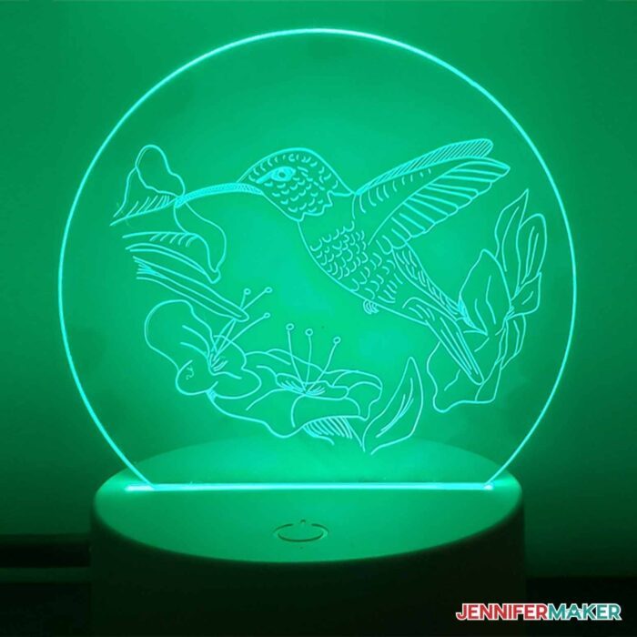Acrylic nightlight with an engraved design of a bird
