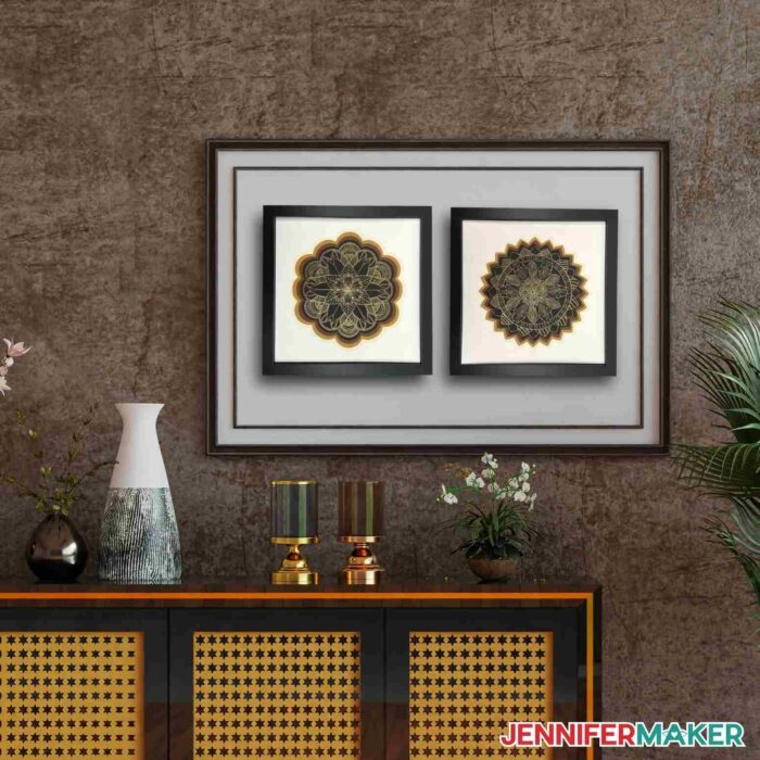 Two framed Cricut foil projects on display in a home
