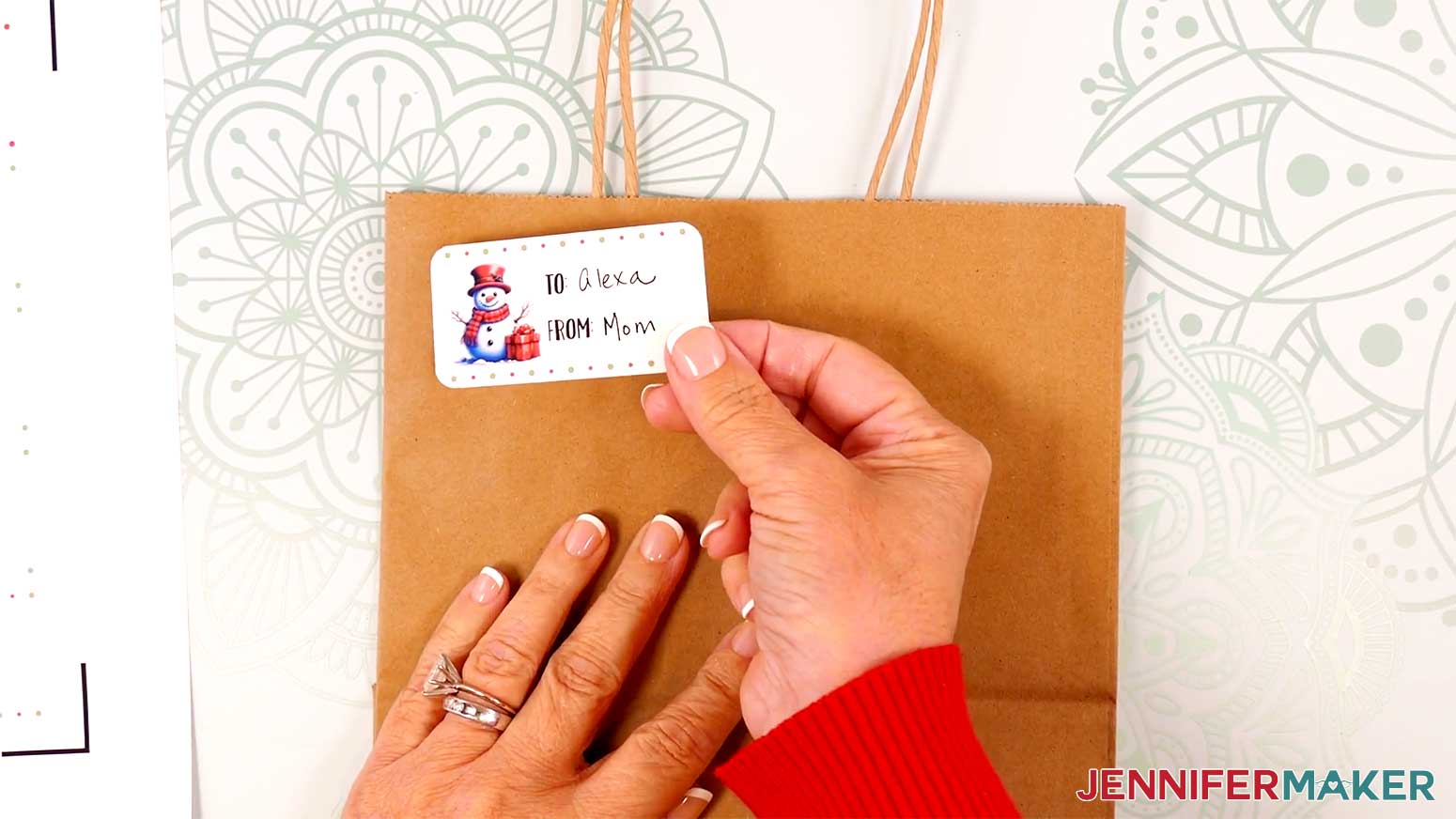 Stick Print Then Cut gift label to a gift bag in the Cricut Gift Wrapping Ideas project.