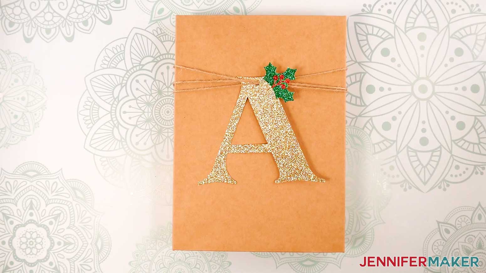 The finished Holly Letter Gift Tag with a gold glitter cardstock letter A with holly leaf attached.