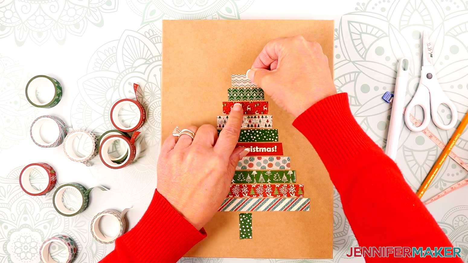 Add several more pieces of gradually smaller pieces of washi tape above and parallel to the previous for the Washi Tape decoration in the Cricut Gift Wrapping Ideas project.
