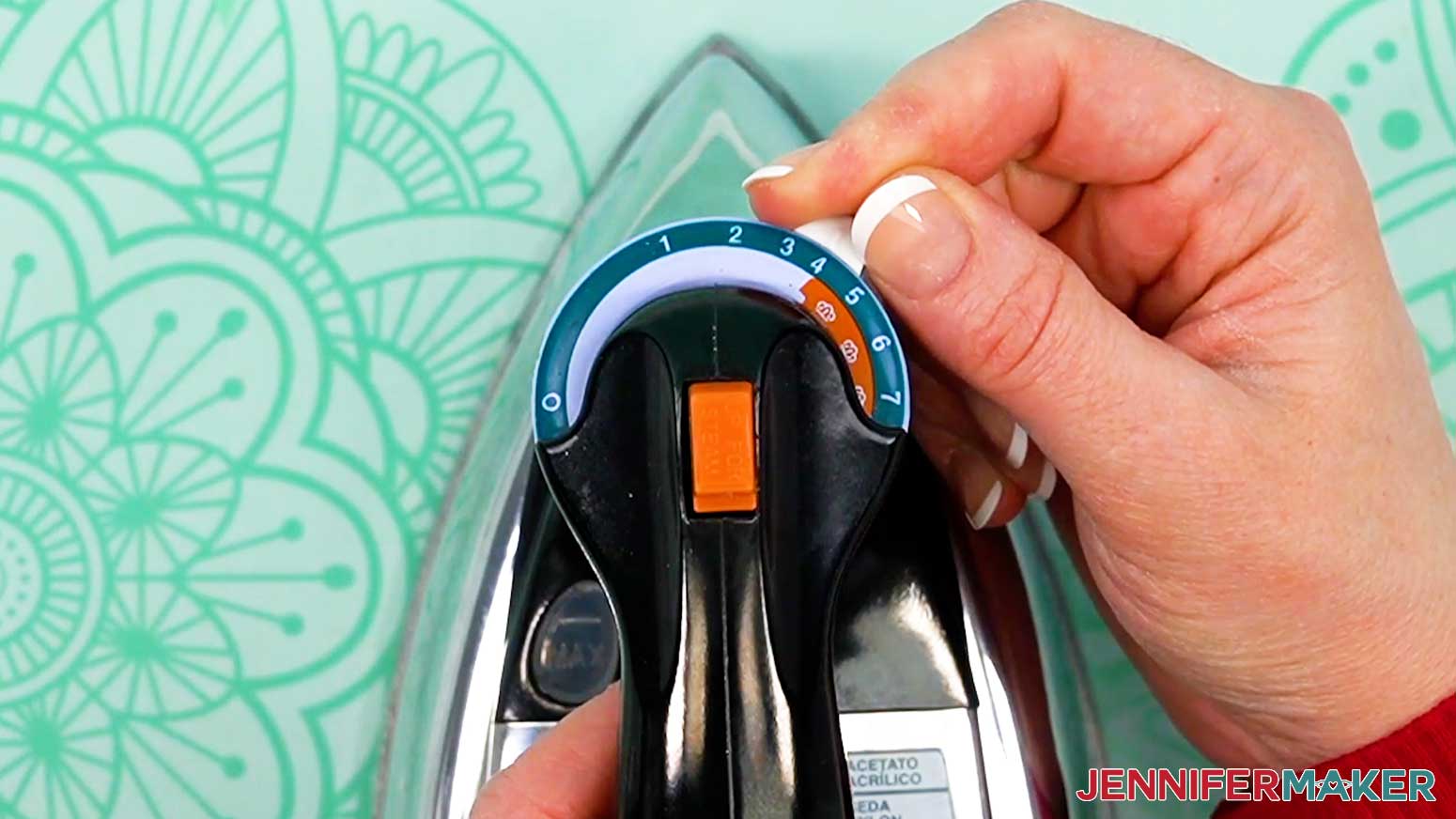 Use the correct setting for the material when pressing iron-on vinyl with a household iron.