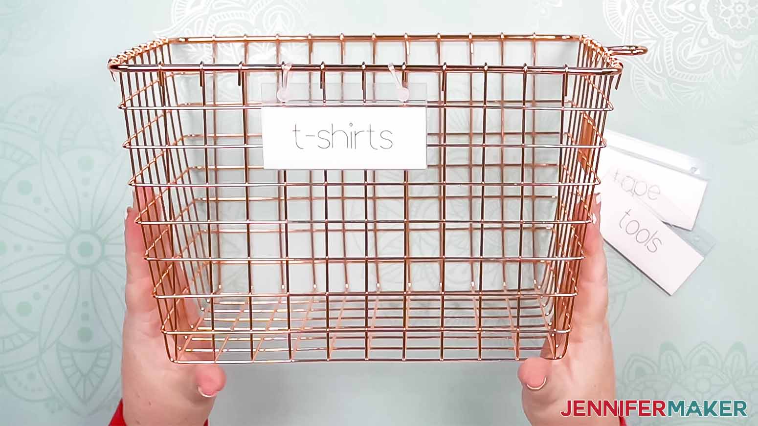 Wire basket with a hanging label holder written using a Cricut.