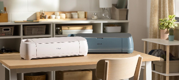 Cricut Explore 4 and Cricut Maker 4 in new Seashell and Sage colors.