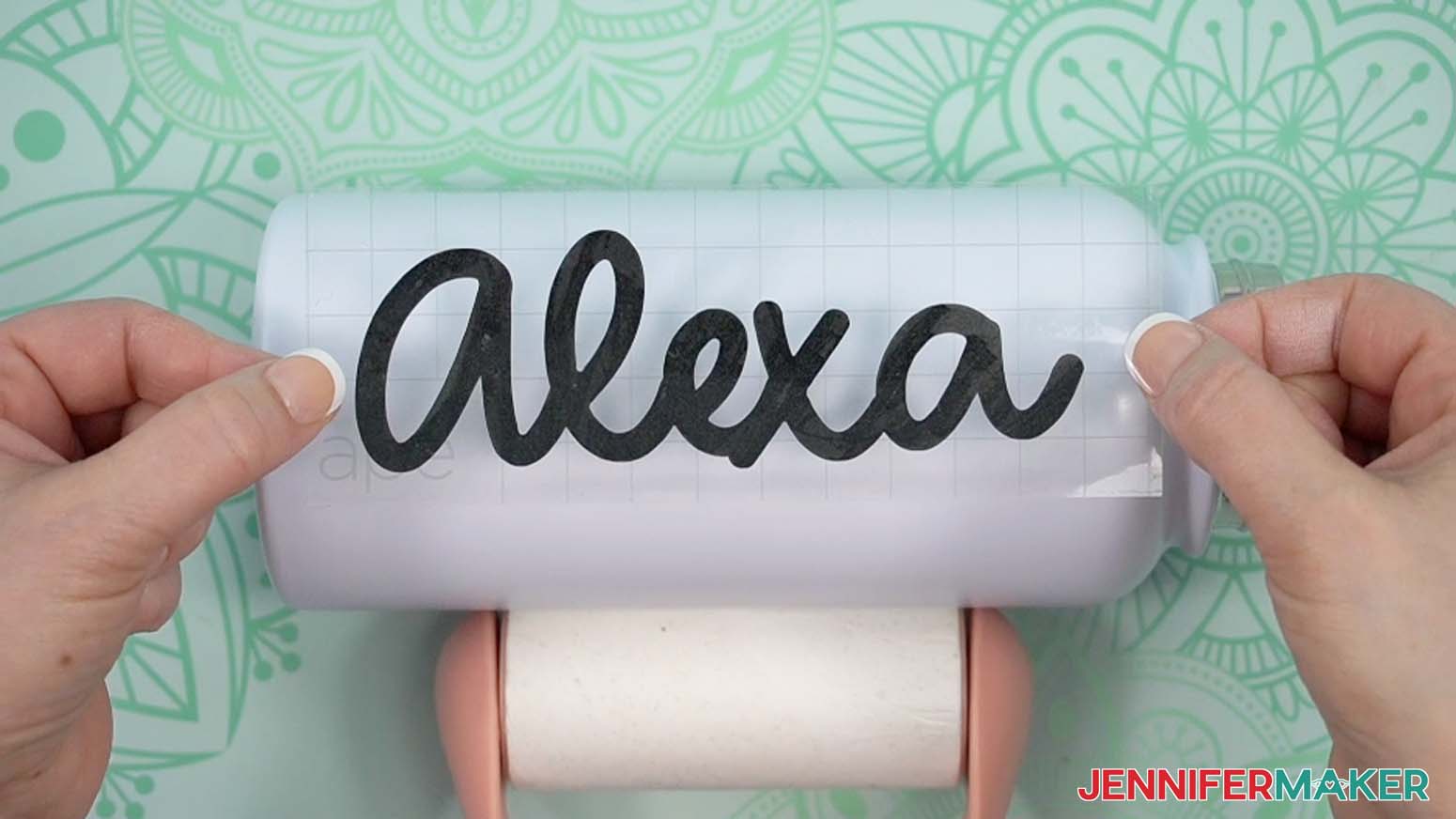 Apply the adhesive vinyl design and transfer tape to the side of the water bottle.