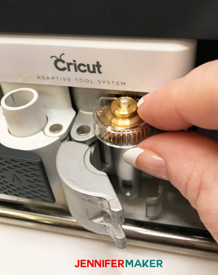 Putting the Cricut Maker engraving tool into the Adaptive Tool System clamp