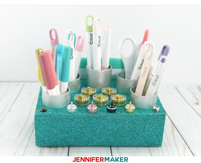 My blue glitter Cricut Tool Bench holds all my Cricut tools and blades!