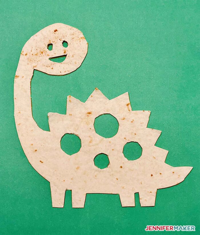 Dino quesadilla made from a food safe stencil cut on a Cricut cutting machine to make the Cricut Tortilla!