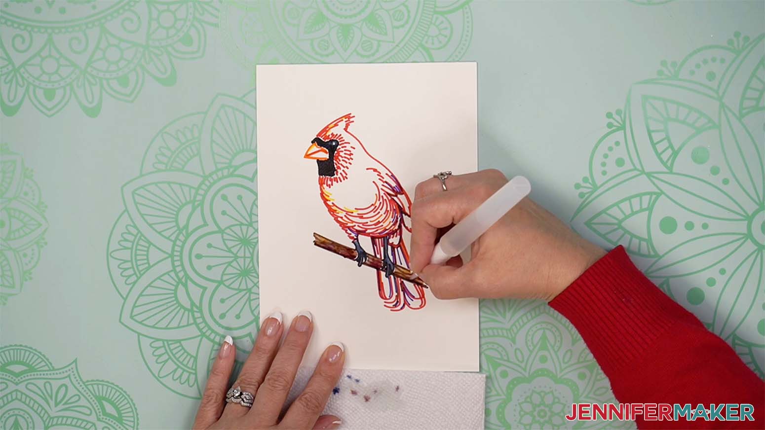 cardinal painting the branch