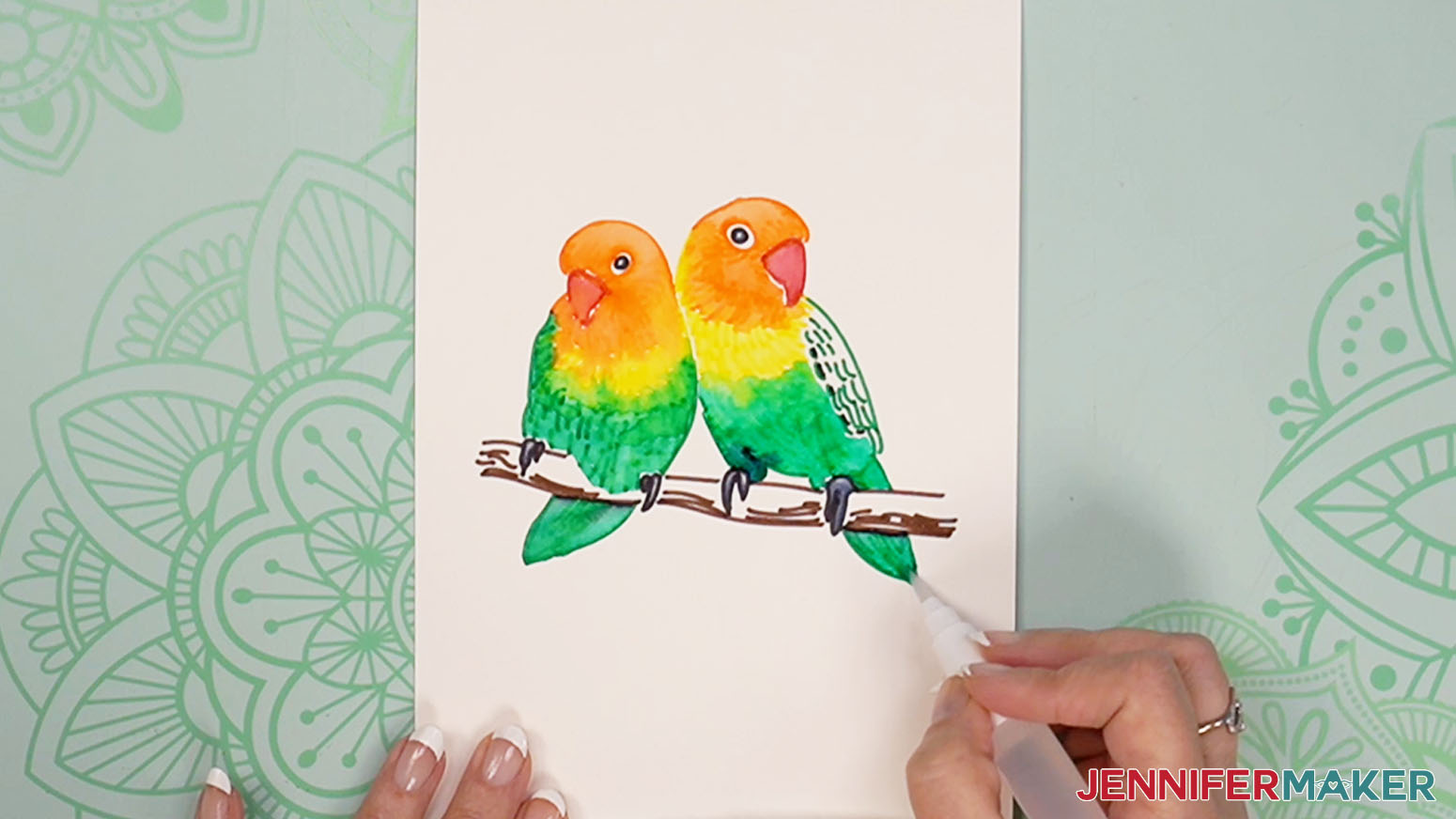 Lovebirds painting the second bird