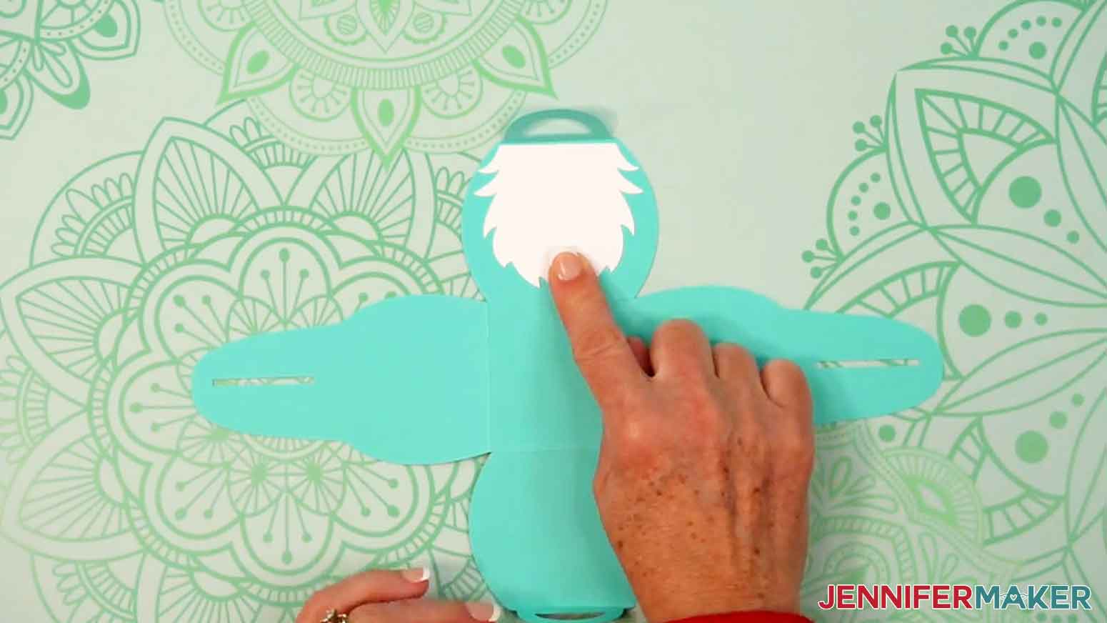 Glue the gnome beard on the front panel of the curvy keepsake box.