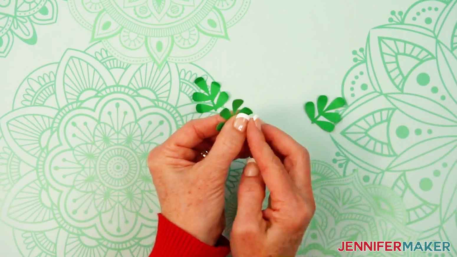 Gently shape the leaves to curl the edges up a bit.