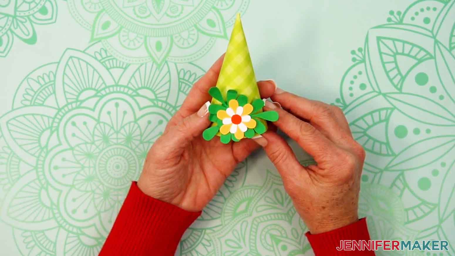 Glue the flower and leaves to the gnome hat.