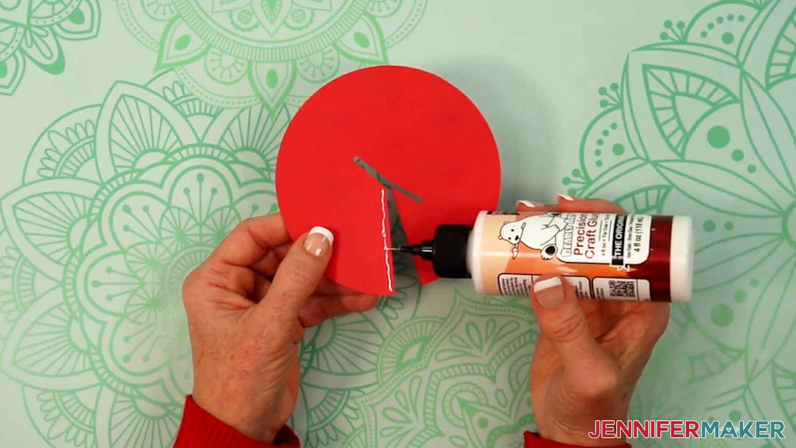 Add a line of glue along the cutout edge of the roof.
