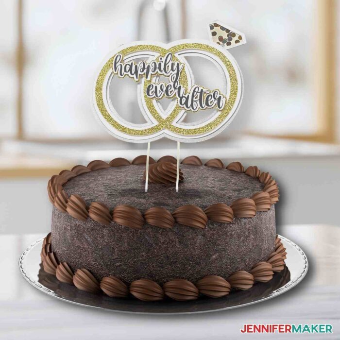 Custom "happily ever after" cake topper on top of chocolate cake