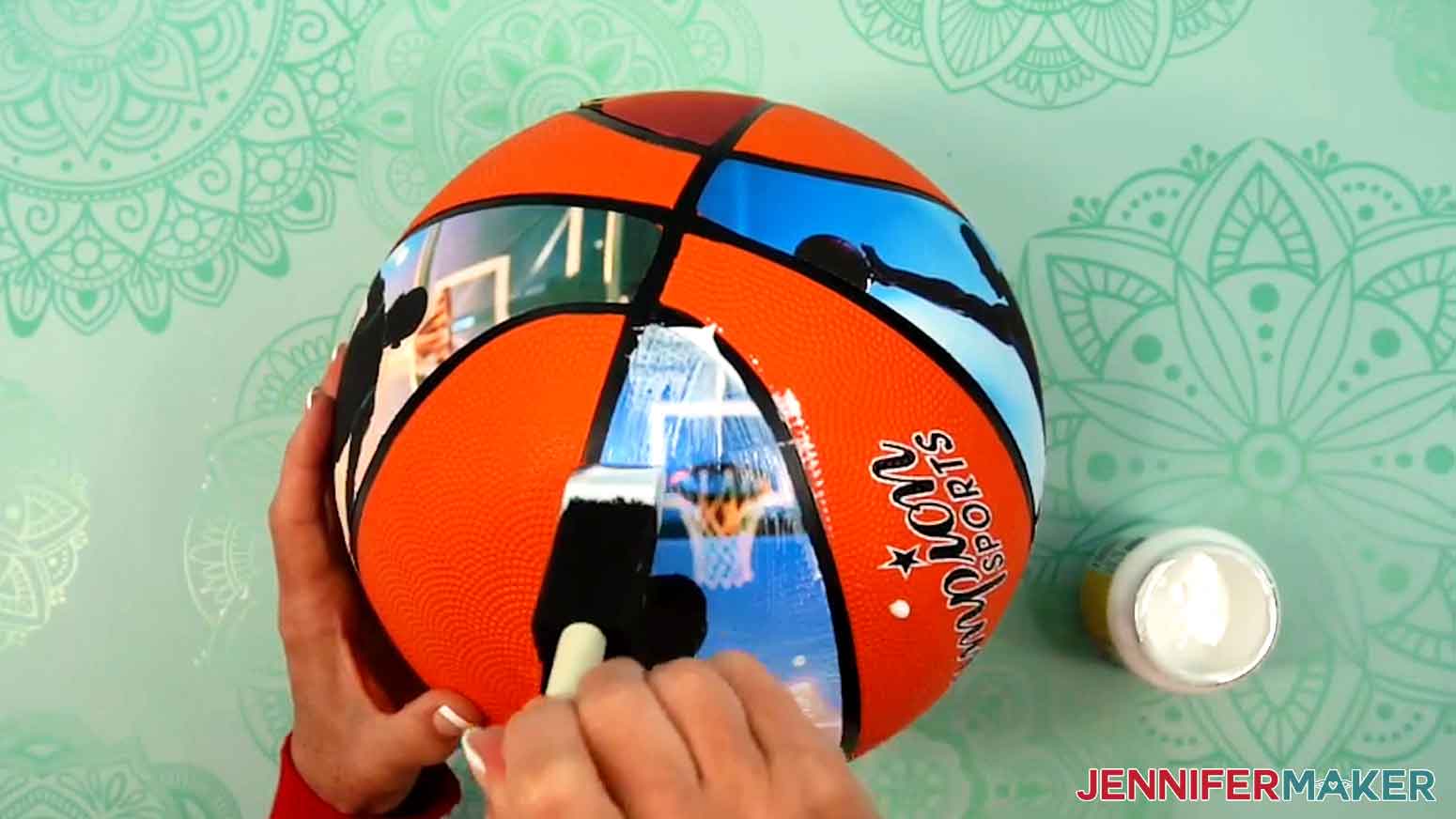 Use a foam brush to apply mod podge to the photo sports ball.