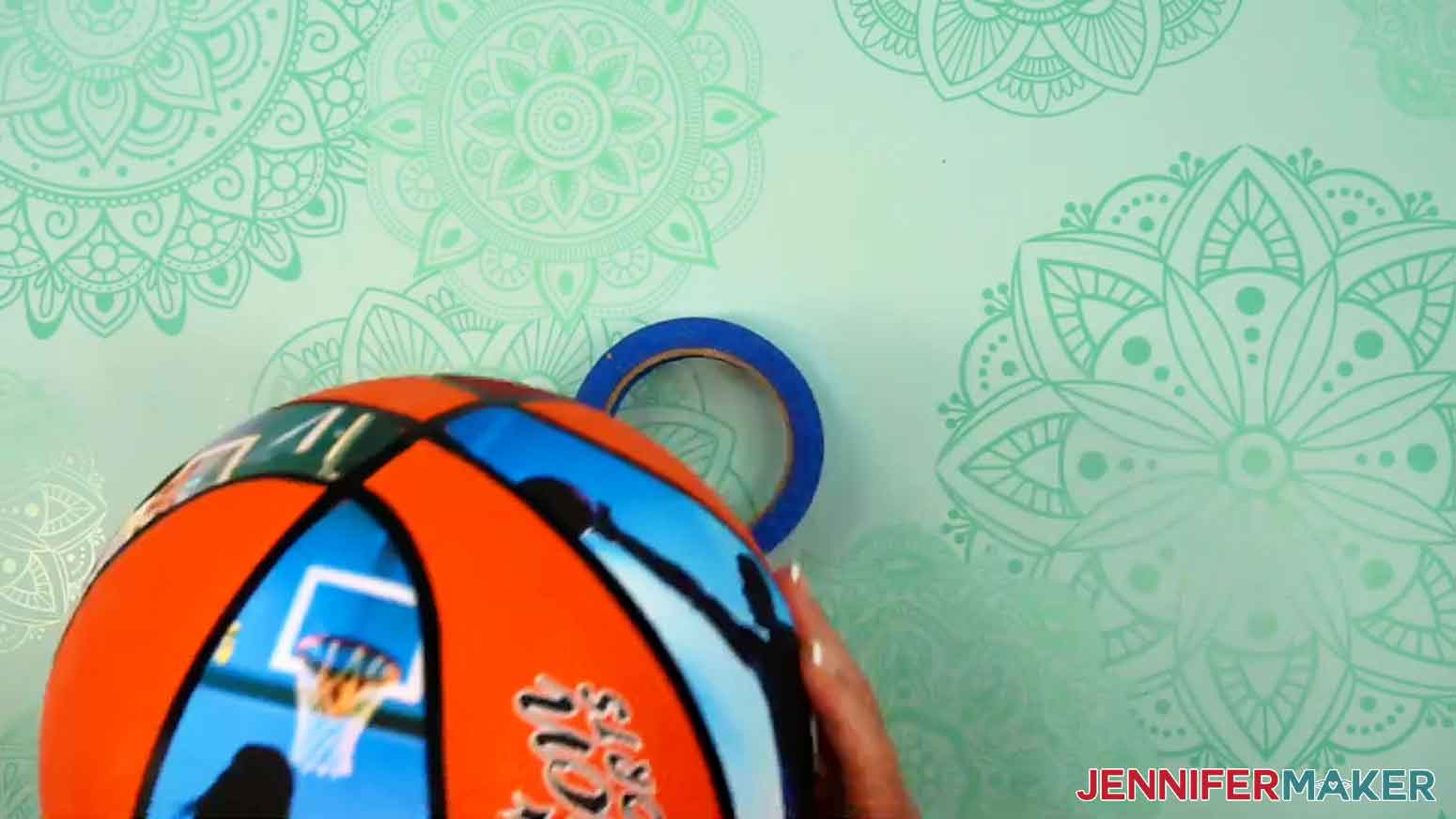 Place the sports ball on a flat roll of painters tape to stabilize the ball when applying the sealant.