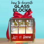 Decorated Glass Blocks with Lights and Vinyl, including a free design for a pretty snowy window scene #holidaydecor #glassblock #vinyl #cricut #diy