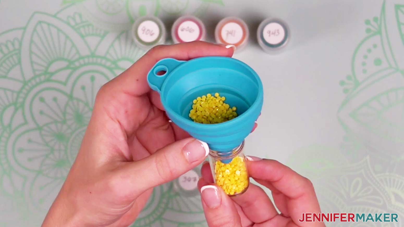 Use a funnel to fill the vial with the color diamond drills.