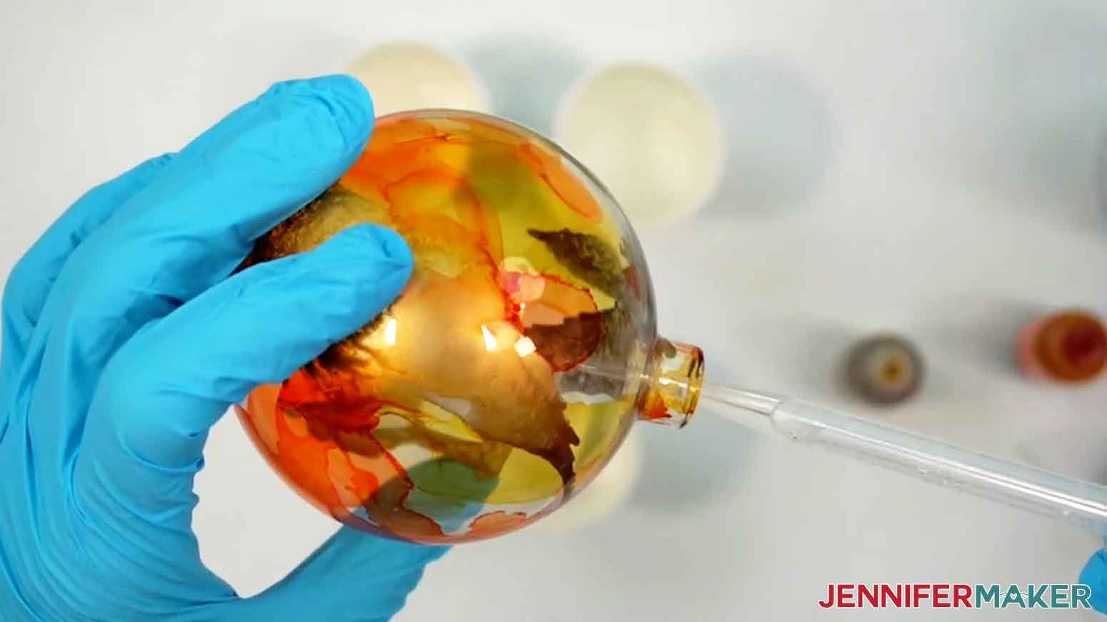 Use a pipette to drip isopropyl alcohol into the opening of the ornament to reactivate the ink after it&rsquo;s dried, or to &ldquo;erase&rdquo; areas.