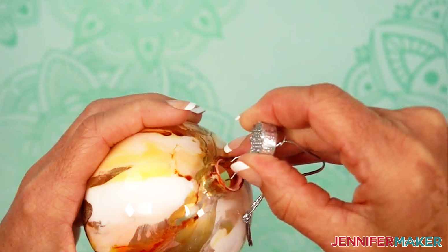 Let the ornament dry overnight (at least 8 hours) before reinserting the cap and hanger.