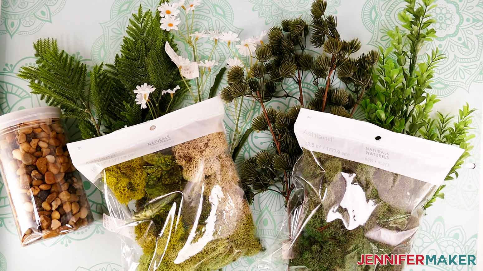 River rocks, floral branches, and two types of moss decorations for the enchanted forest diy book nook