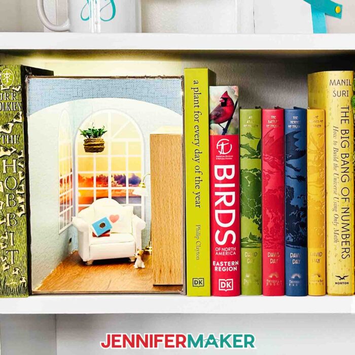 DIY book nook decorated as a reading room using doll furniture.