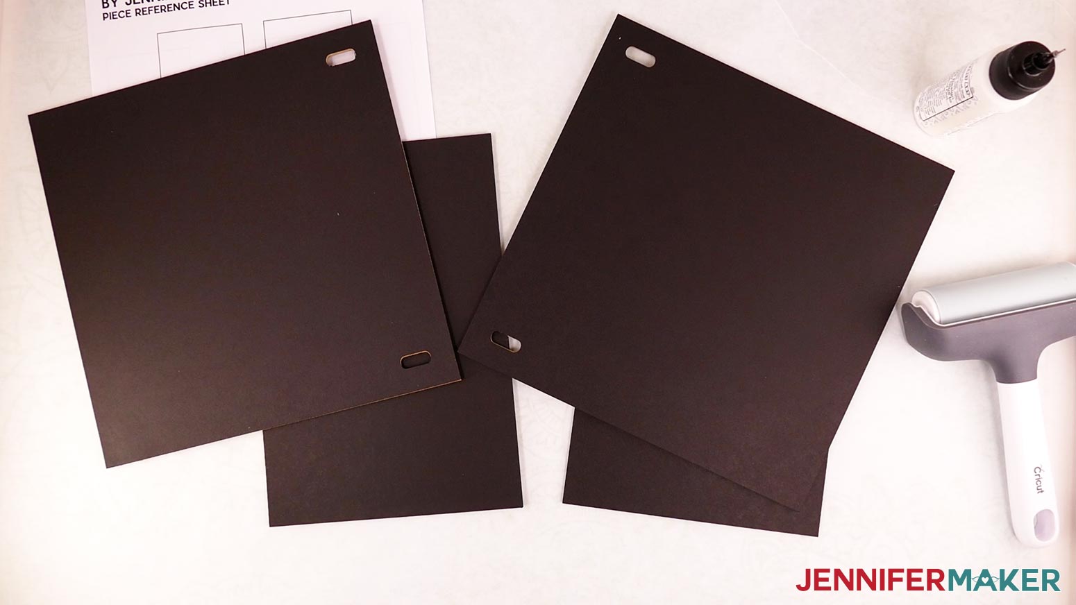 Black cardstock liners attached to the inside of the diy book nook chipboard pieces