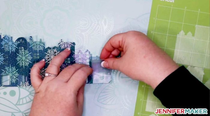 Attaching the wax paper backs to the DIY Christmas Countdown