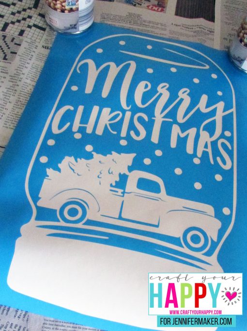 The finished stencil for the DIY Christmas Mason Jar Snowglobe Chalkboard Sign