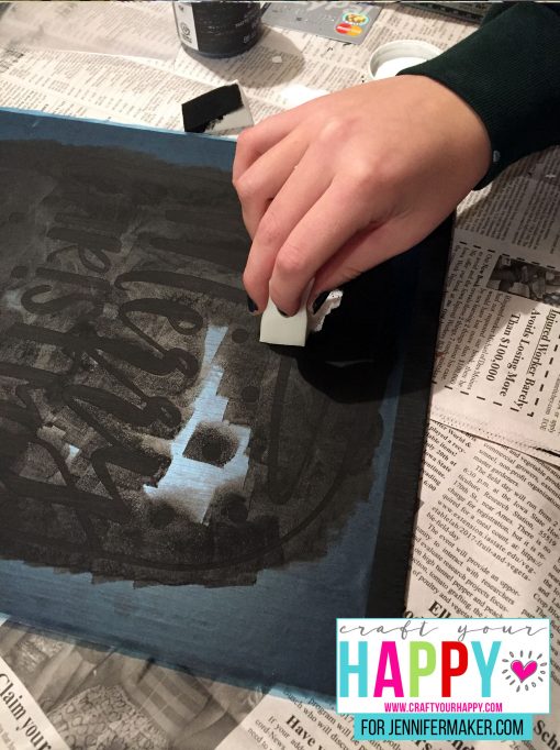 Sponging the stencil for the DIY Christmas Mason Jar Snowglobe Chalkboard Sign