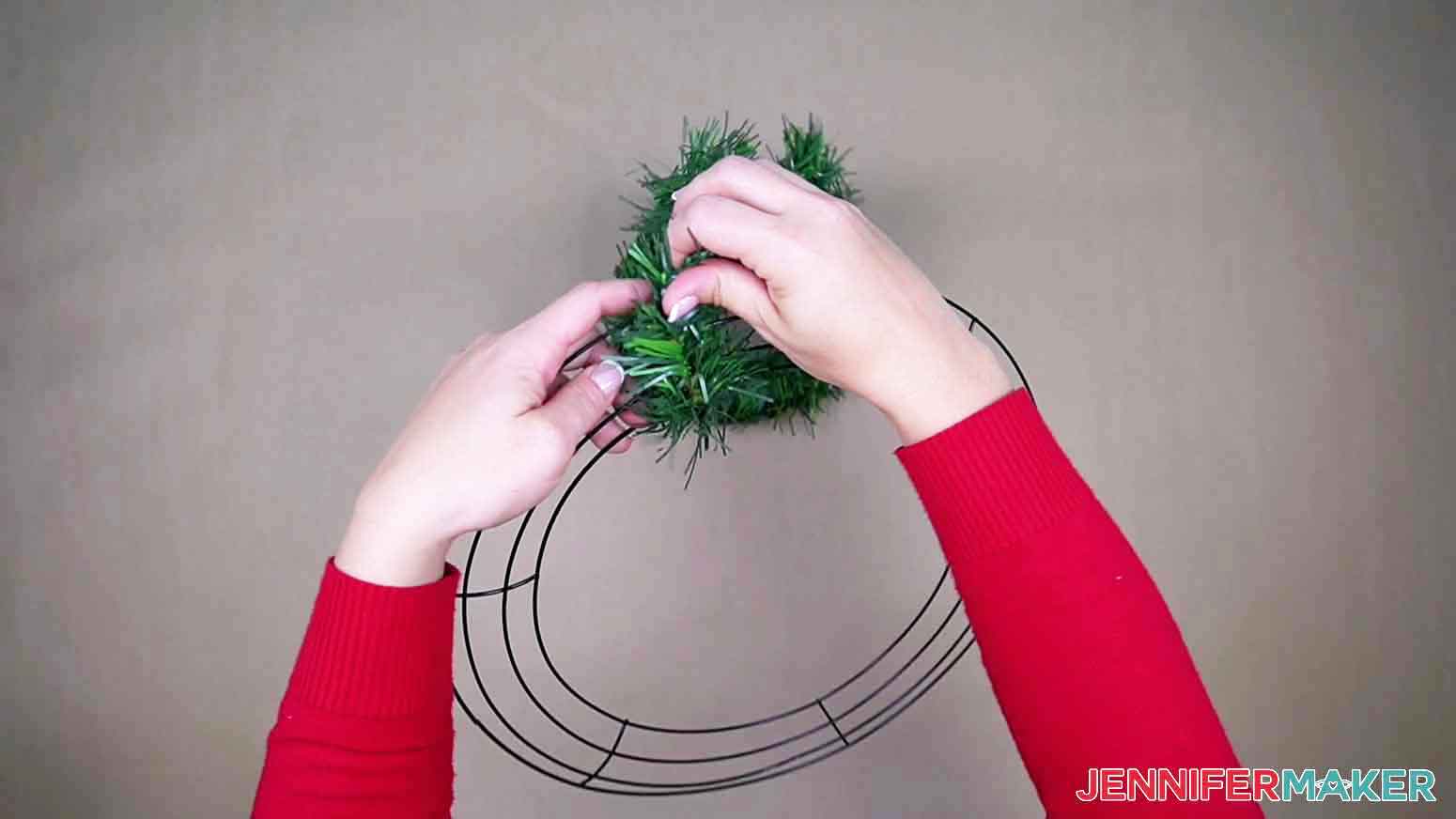 Wrap garland strand around wire wreath form.