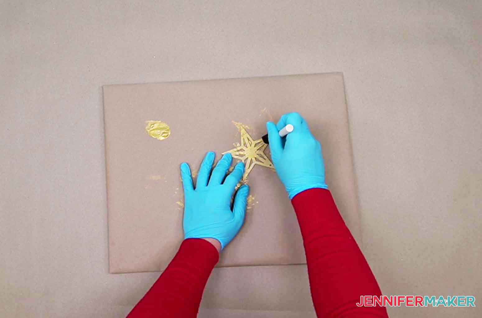 Use a foam paint brush to paint wooden star for mini tree topper.