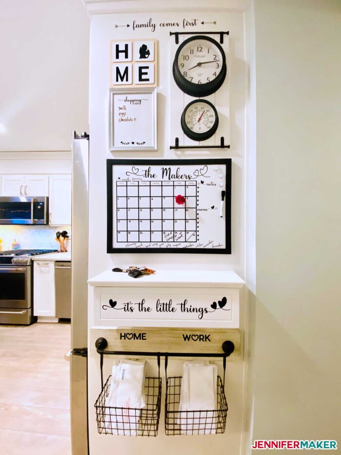 Black & white Family Command Center on a white kitchen wall