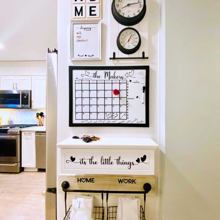 Black & white Family Command Center on a white kitchen wall