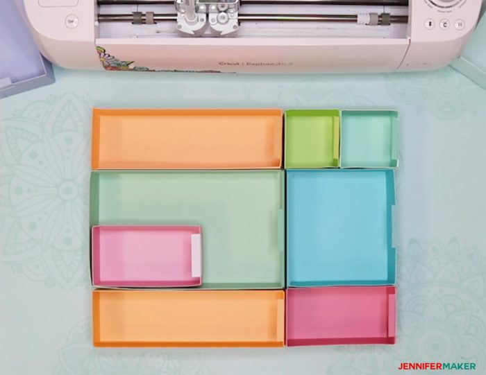 Colorful boxes made by hand to become DIY drawer dividers to organize a drawer