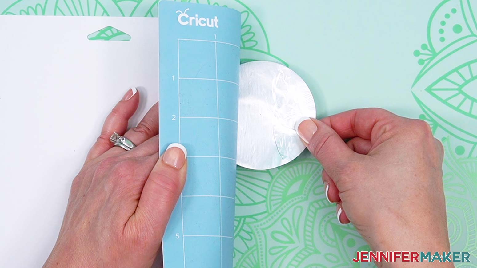 Flip the machine mat and gently peel it away from the aluminum foil so it doesn't tear.