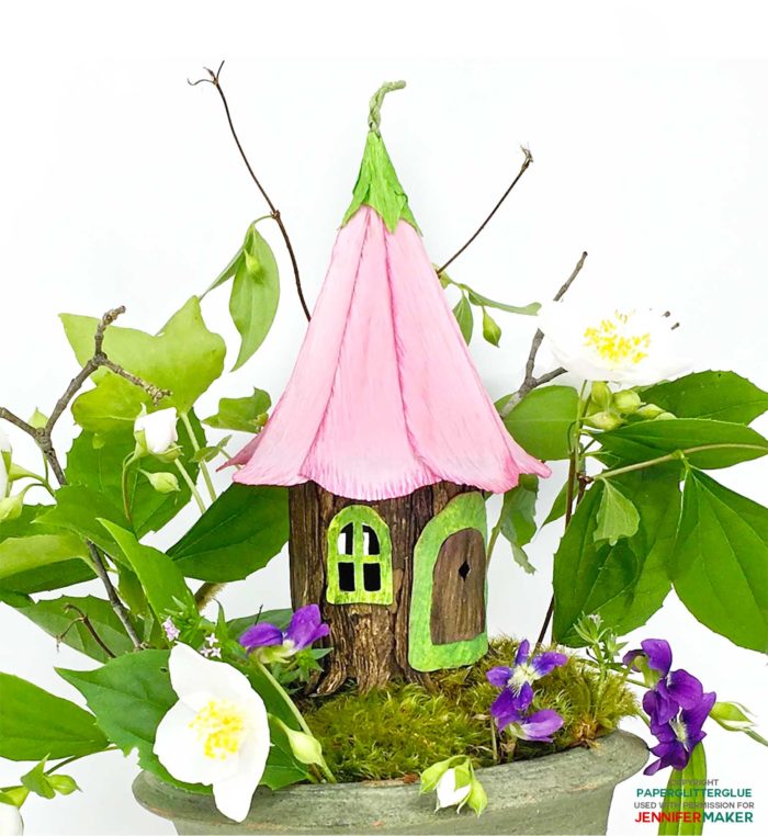DIY Fairy House with a flower petal roof made entirely from paper and glue with a full tutorial, including free templates and SVG cut files! #cricutmade #fairyhouse #papercraft #svgcutfiles