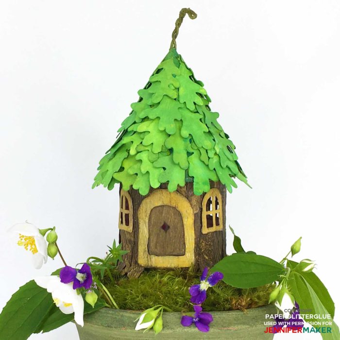 DIY Fairy House with an oak leaf roof made entirely from paper and glue with a full tutorial, including free templates and SVG cut files! #cricutmade #fairyhouse #papercraft #svgcutfiles