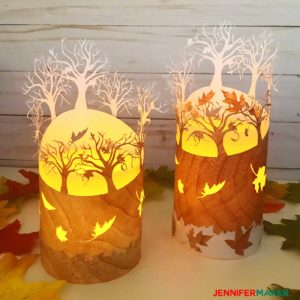 Two pretty paper fall luminaries with falling leaves