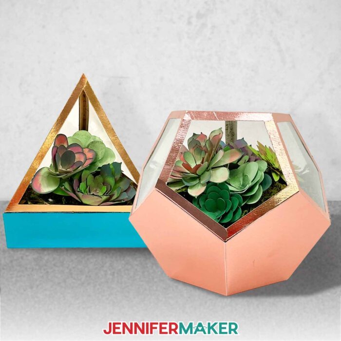 Learn how to make a DIY faux terrarium with JenniferMaker's tutorial! Two small faux terrariums made with metallic and multicolored cardstock, filled with a variety of hand-inked cardstock succulents.